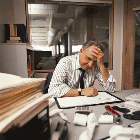 Man desk stressed 